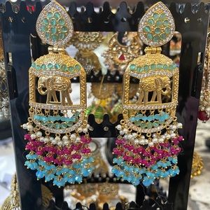 Ad earrings elephant design